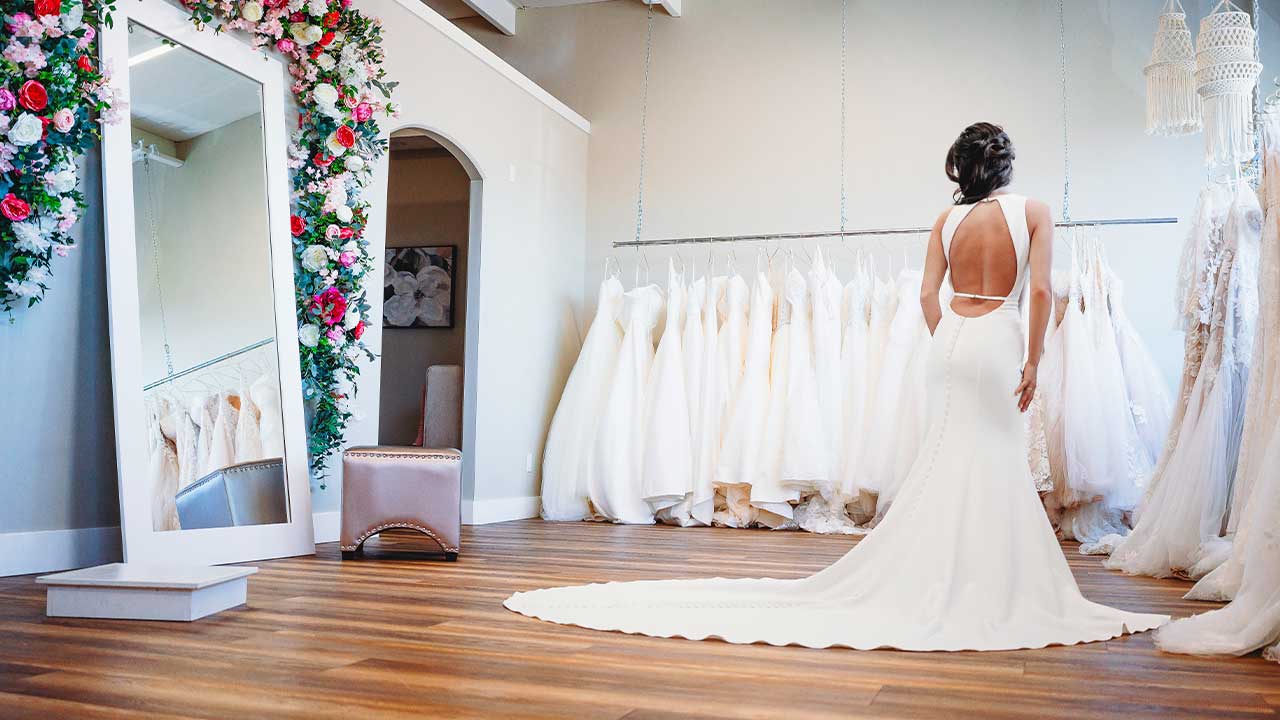 Bride-to-be trying on wedding gown